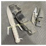 2 large knives. One 7 1/2'  Stainless