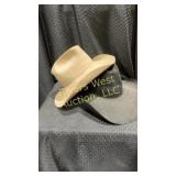 2 felt hats. 1 black 4 X Stetson hat. 1 cream
