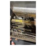 Tin box full of wood drill bits