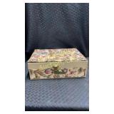 Jewelry box full of vintage costume jewelry.