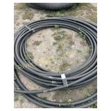 Approximately 250 feet  1 1/4' poly pipe
