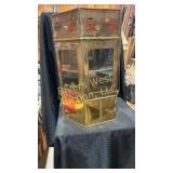 Small antique display. Glass walls with metal