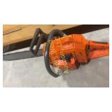Husqvarna chainsaw with a plastic Husqvarna case