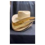 5 straw cowboy hats. five straw hats of various