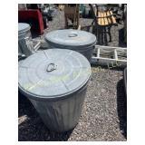 Two Galvi 30 gal trash cans with lids