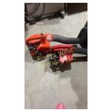 2 small leaf blowers. Red Max HBZ2600. Echo
