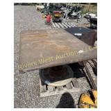 Hydraulic lift swivel table