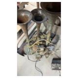 Assortment of vintage car horns and parts
