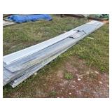 Approximately 50 sheets of used roofing tin