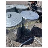 Two Galvi 30 gal trash cans with lids