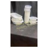 White glass dishes with blue floral design.
