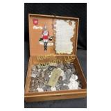 Wooden box filled with various Canadian coins