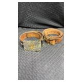 2 decorative leather belts. 1 black leather belt