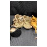 3 pair of kids moccasins1 pair of kid shoes