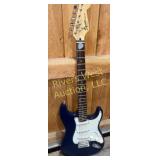 Squier Bullet electric guitar.  with soft case.