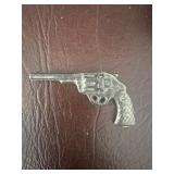 Cast Metal Revolver-Shaped Decorative Piece