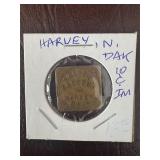 Brass Token from Sguttï¿½s Grocery, Harvey, N.D.
