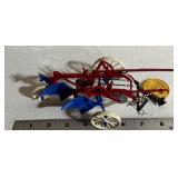 American Precision Models Plow with Medal
