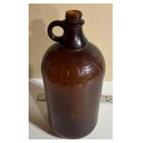 Brown Glass Jug Embossed with Purex Logo