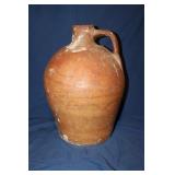 Large pottery whiskey style jug