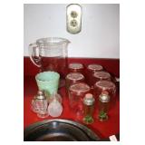 Pink Depression cups, green Depression salt and