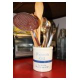 Wesson Oil crock containing kitchen utensils