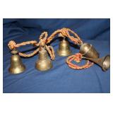 String of brass bells
