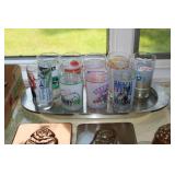 Lot of 9 Kentucky Derby glasses sitting on a tray