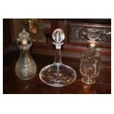 3 Decanters one is signed on the bottom