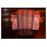 Small accordian (played when tested)