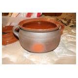 Pottery handled bowl, Evenflow glass bottles in a