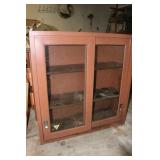 Metal cabinet with sliding doors