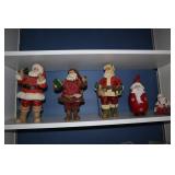 Shelf lot - 5 Santa figurines (resin & wood)