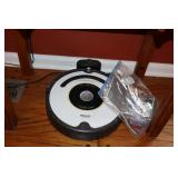 Irobot Rooba with paperwork and accessories (not