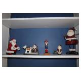 Shelf lot - 5 Santa figurines including one