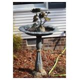Metal bird bath featuring frog on lily pad