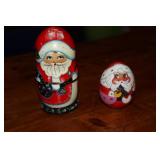 Pair of Russian Santa Claus nesting dolls (one