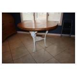 Cast iron base table 42' with round wood top
