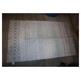 Gray and white accent rug 59' x 35'