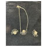 Necklace and matching earrings with an open