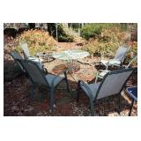 Metal table, 6 chairs and metal firepit (missing