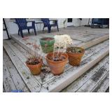 Lot - terracotta planters and elephant planter