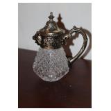 Silverplate and glass lion head syrup