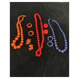 Costume jewelry necklaces and earrings