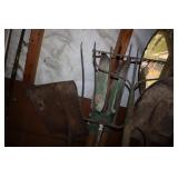 Trash can with lid and yard tools - pitch forks,