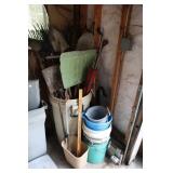 Trash can with lid and yard tools - Rakes,