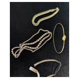 Costume jewelry necklaces and belts