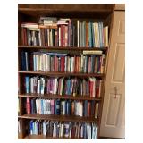 Large assortment of books on right side of