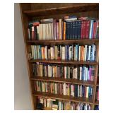 Large assortment of books on left side of