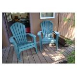 2 plastic adirondack style yard chairs and